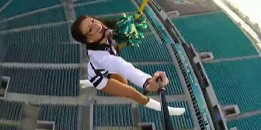 NFL cheerleaders, mascot zip line over stadium Fox News Video