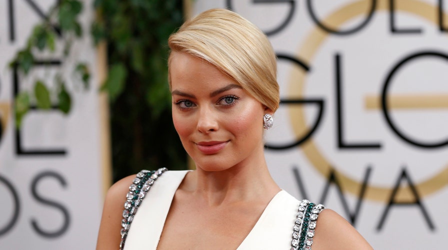 Get Margot Robbie's Sleek Bun Hairstyle