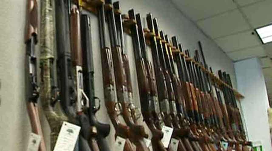 Guns flying off store shelves as control debate heats up