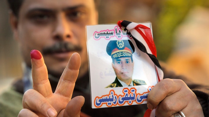 Critics: Egypt vote an attempt to legitimize military gov't