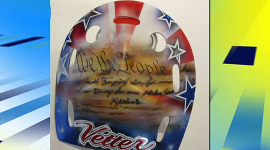 Team USA goalie forced to remove Constitution helmet tribute