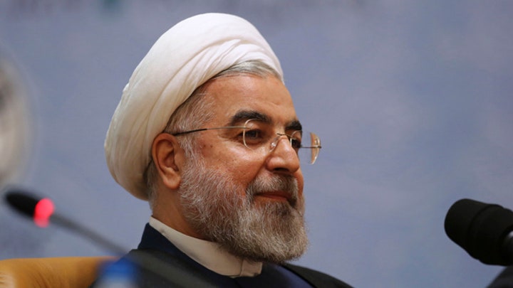 Sanctions lowered as Iran starts work on nuke deal