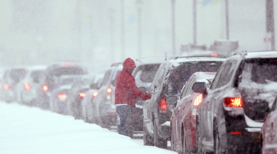 Massive winter storm strands travelers across the nation