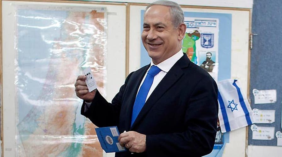 Exit polls show Netanyahu, allies win Israeli election