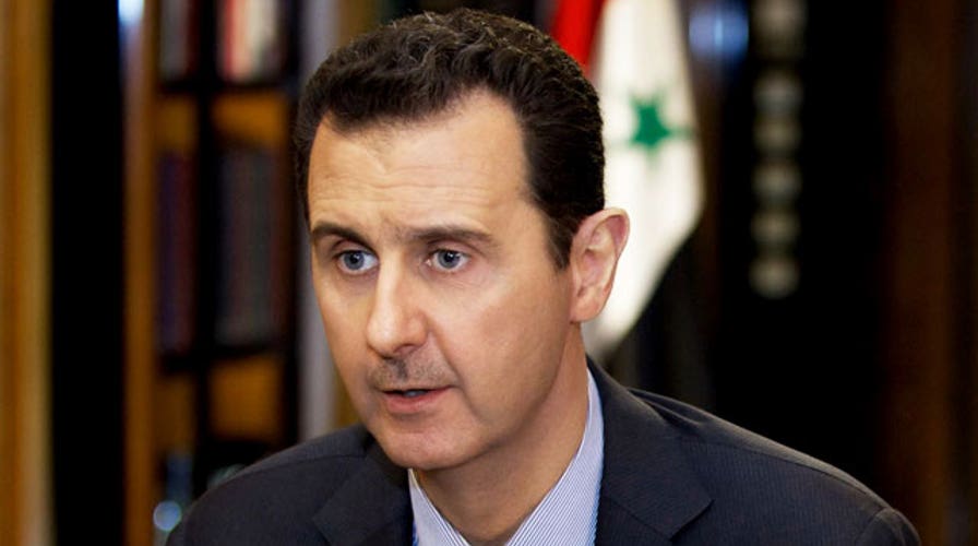 Assad must go: Syrian peace talks get off to tense start