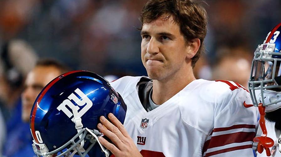 Giants, Eli Manning sued in fake game gear scam