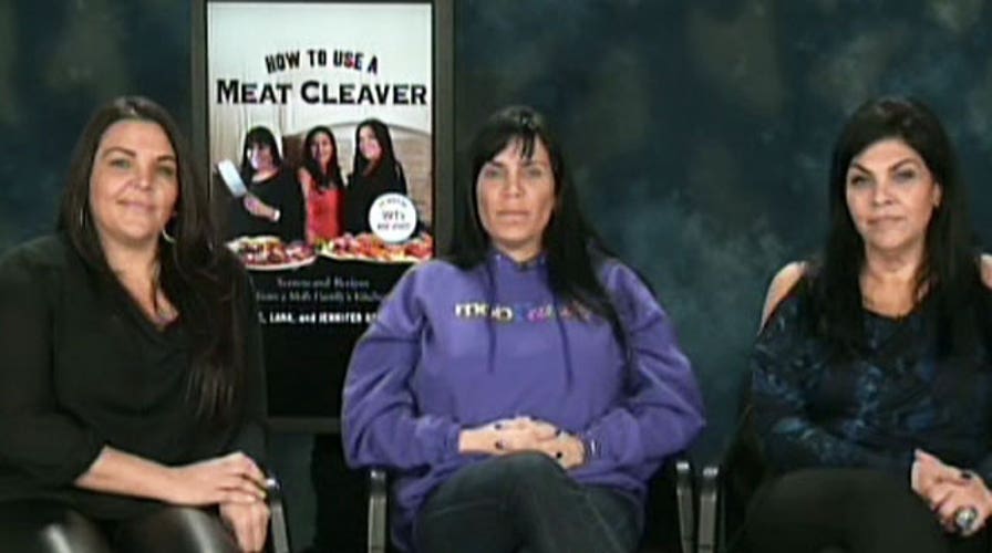 Mob wives demonstrate how to use a meat cleaver 