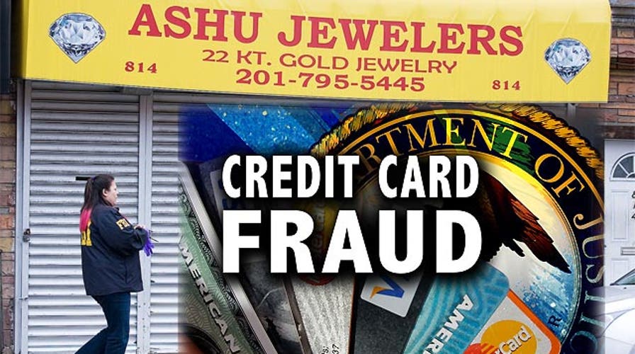 18 suspects charged in apparent $200M credit card scam