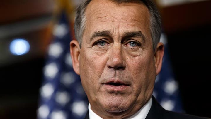Squeezed by conservatives, Boehner blinks on debt ceiling