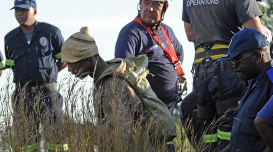 Illegal miners trapped in South Africa refuse to be rescued