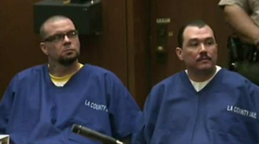 Two admit guilt in attack on Giants fan at Dodger Stadium