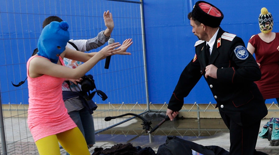 Anti-Putin punk band whipped by Cossacks in Sochi