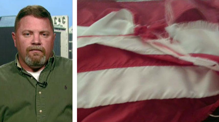 Navy veteran fired for replacing tattered American flag?