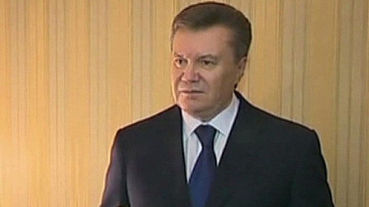 Ukraine president flees capital, calls it a coup