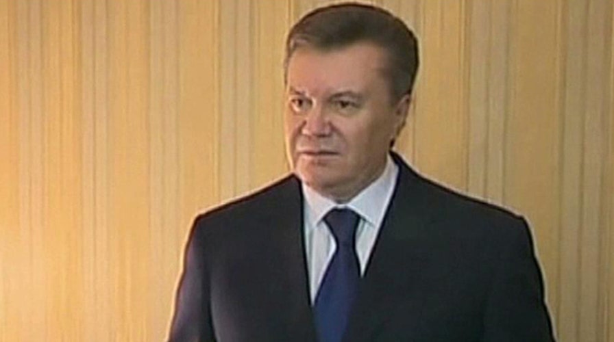Ukraine president flees capital, calls it a coup