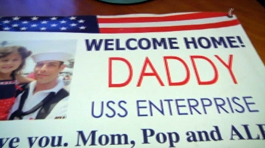 Family fighting to hang ‘welcome home’ sign for sailor