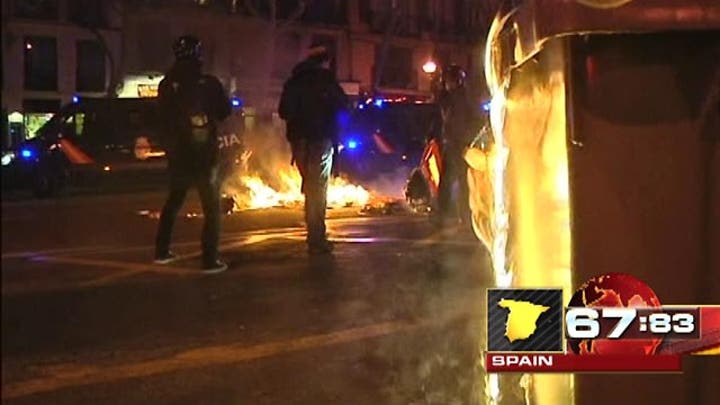 Around the World: Austerity protests turn violent in Madrid