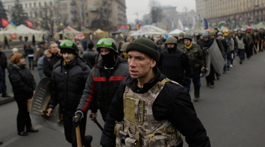 Ukraine's future in flux as protesters remain in Kiev