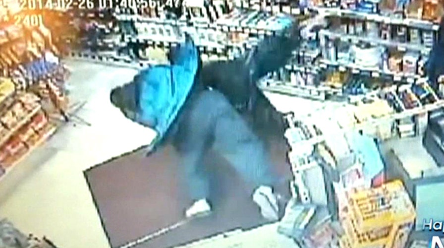Hero clerk body slams armed suspect in robbery attempt