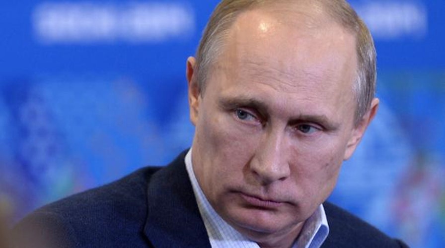 Putin defends military action in Ukraine