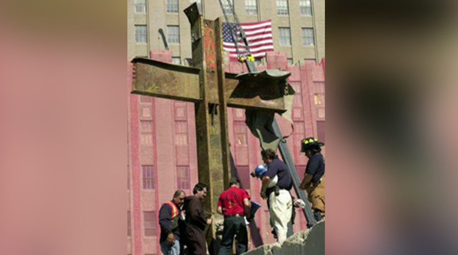 Atheist group sues over Ground Zero cross