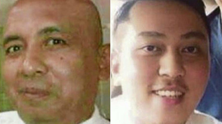 Officials investigate pilots in search for Flight 370