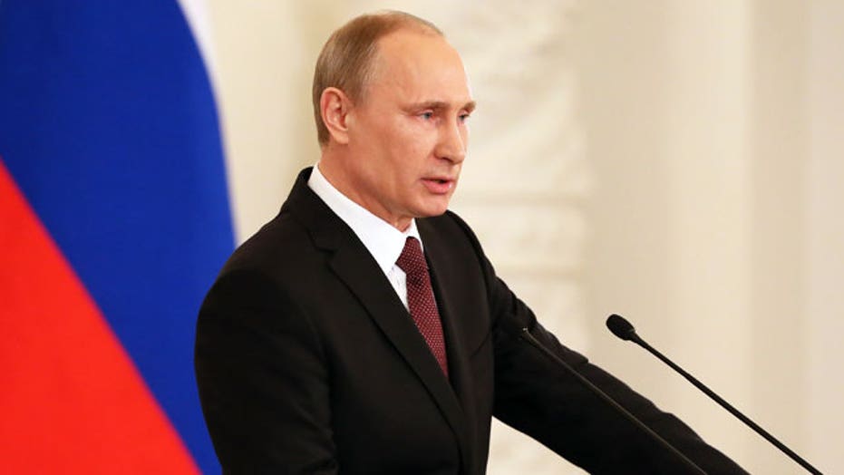 Putin rips West as Crimean leaders sign Russia treaty