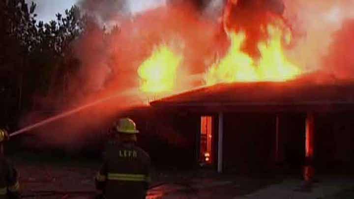 Homeowner sets snake on fire, burns down home