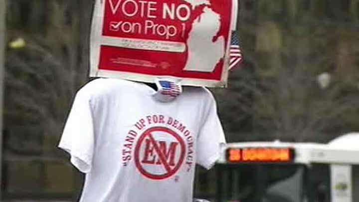 Emergency financial manger greeted by protesters