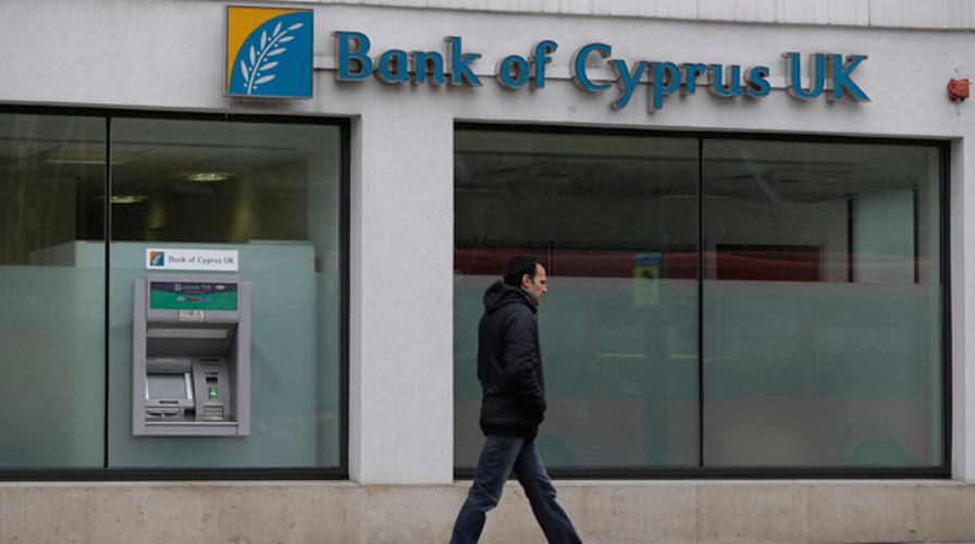 Cyprus extends bank closures