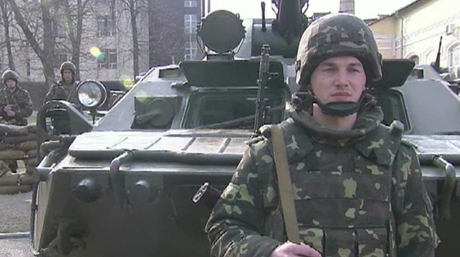 Ukraine prepares for invasion as Kerry meets with Lavrov