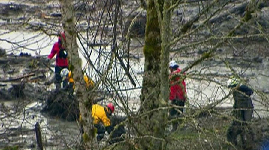 Heavy rains put strain on mudslide search operation