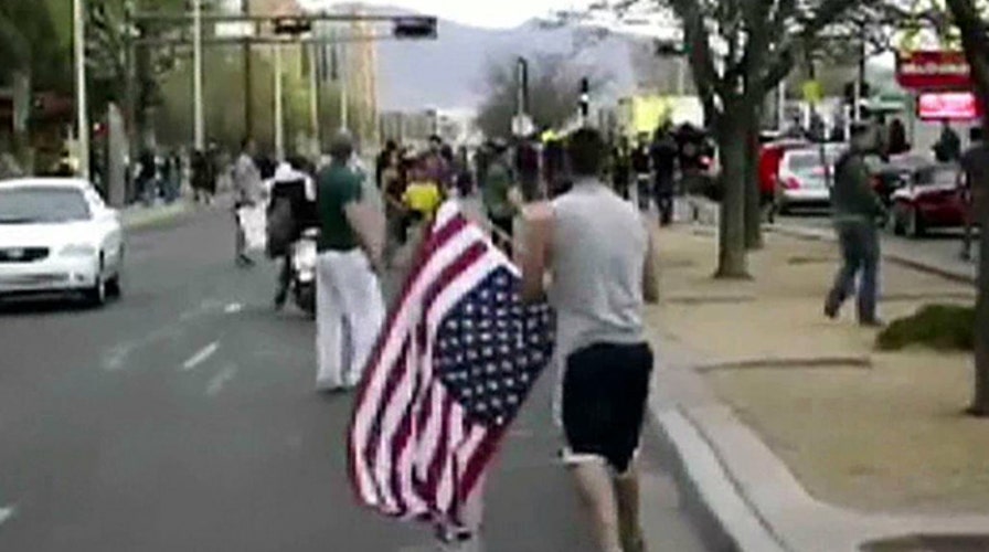 Patriots stop protesters from disrespecting American flag
