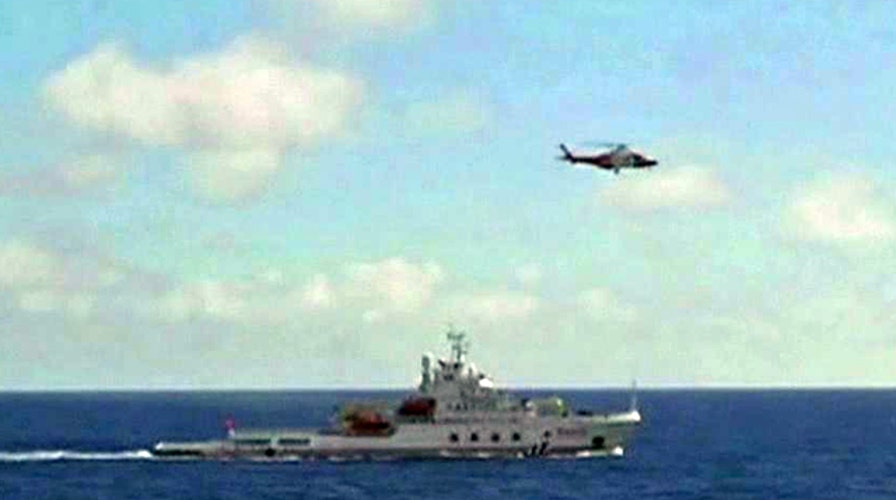 Search for missing Malaysian plane intensifies 