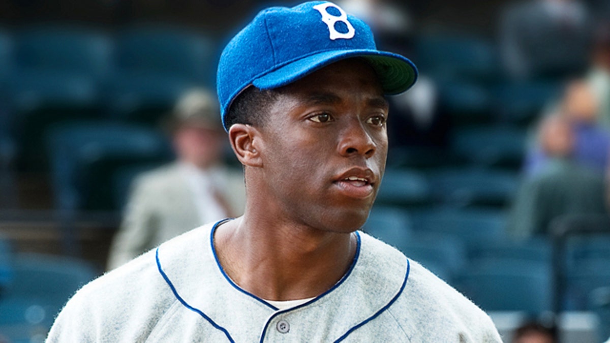 Lucas Black plays Pee Wee Reese and Chadwick Boseman plays Jackie