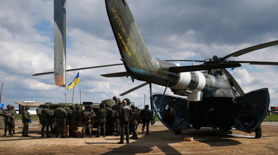 Report: Gunfire heard at Eastern Ukraine airport