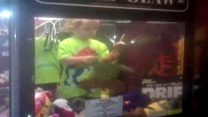Grapevine: Toddler gets stuck inside claw game machine