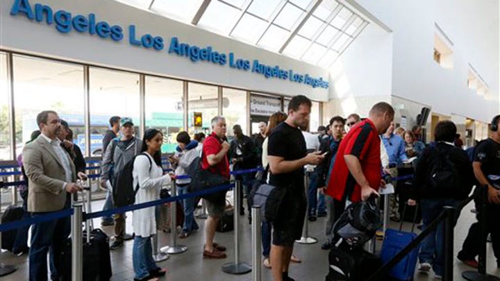 Fliers brace for new fee hikes as delays ripple across US