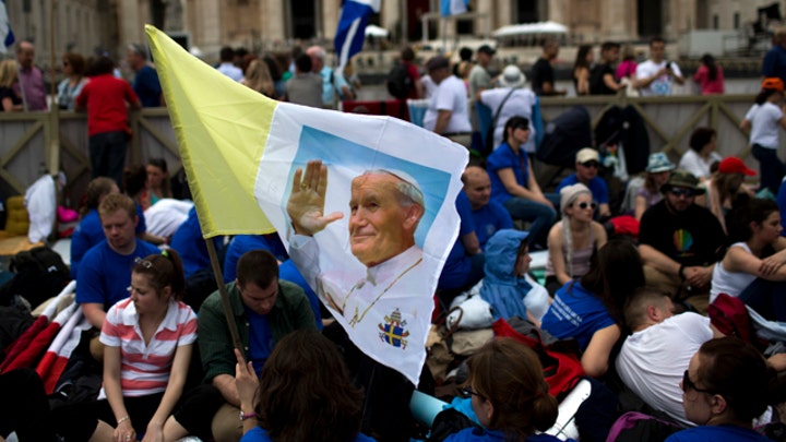Millions gather in Vatican City to witness history 