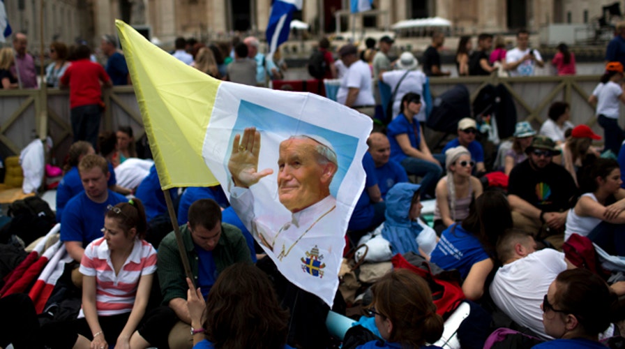 Millions gather in Vatican City to witness history 