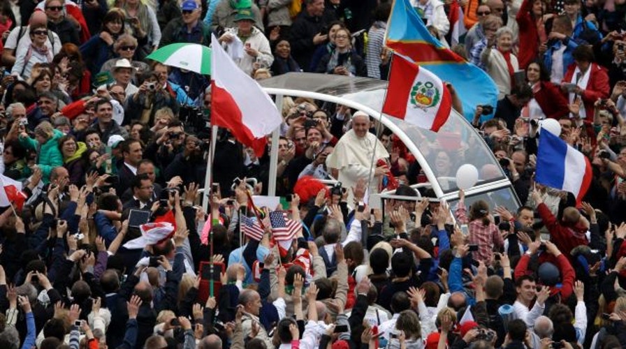 A look at the canonization of Pope John Paul II, John XXIII