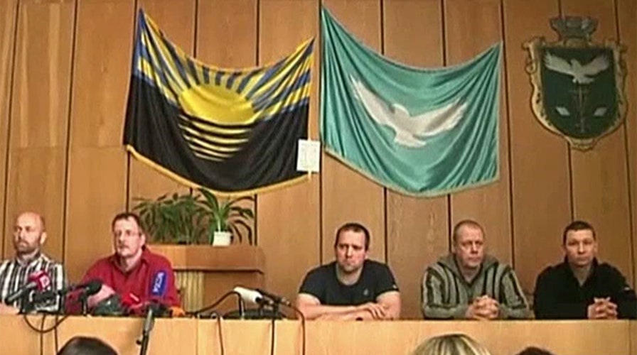 Ukraine: Captured military observers seen for first time