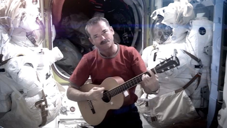 Astronaut makes music video to David Bowie song aboard International