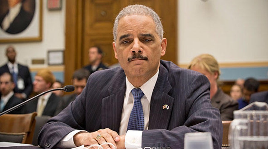 Targeting journalists: Backlash hits Holder, DOJ