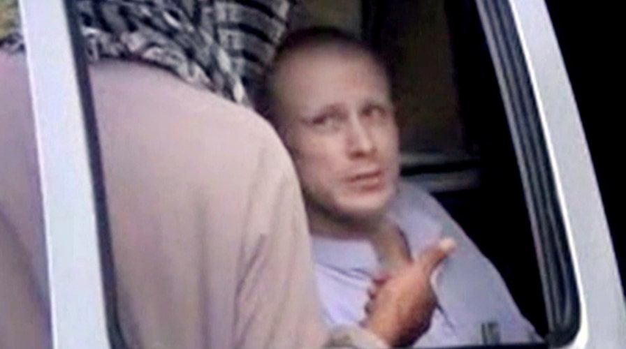 Taliban release video of Bergdahl handover 