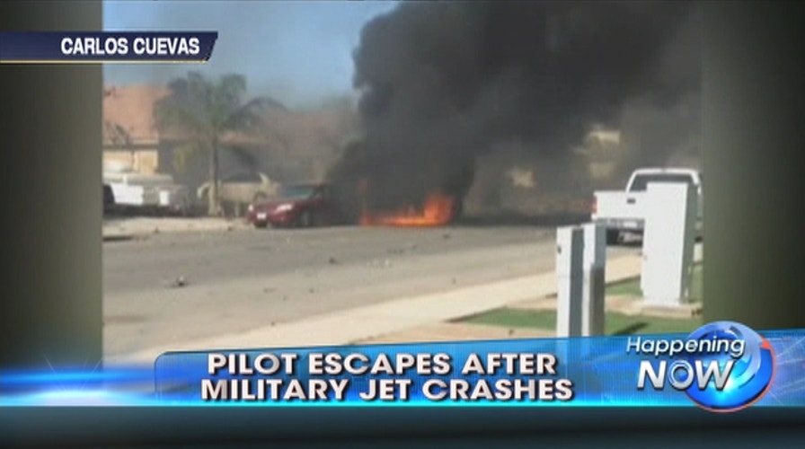 Military jet slams into California neighborhood
