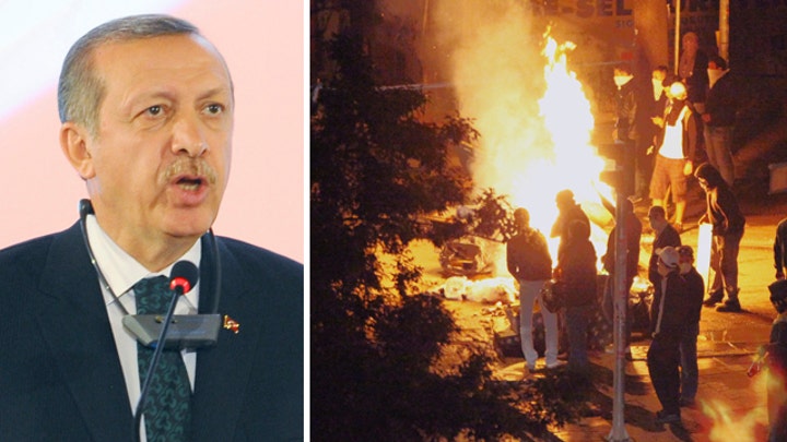 Turkish prime minister defiant in face of deadly mass riots