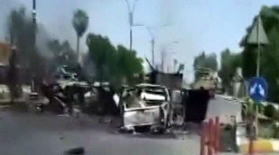 Militants take major Iraqi cities, vow march on Baghdad