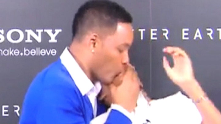 Break Time: Will Smith smooches Jaden 