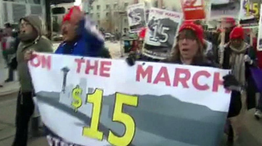 Franchise group sues to block Seattle's minimum wage